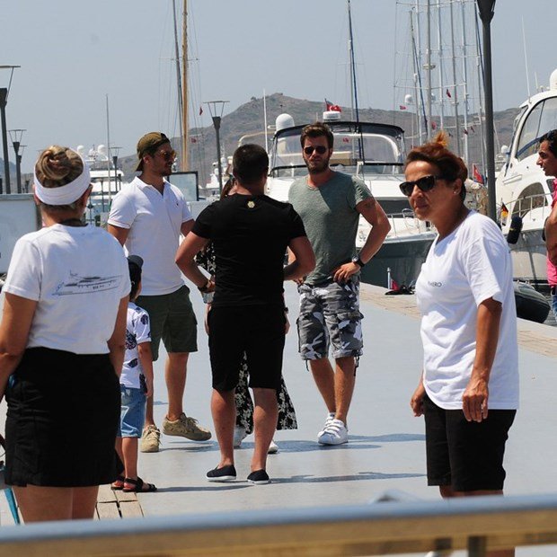 cagatay ulusoy and kivanc tatlitug in bodrum yacht marina