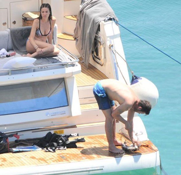 kivanc tatlitug is fishing in yacht