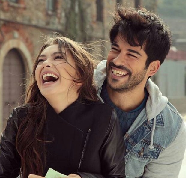 neslihan atagul and burak ozcivit smiling