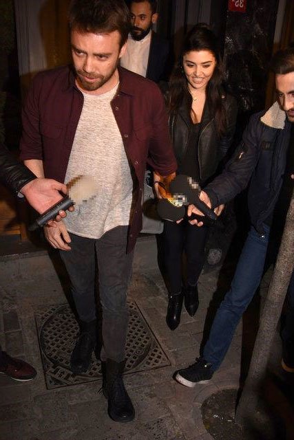 Hande Ercel and Murat Dalkilic together hand-to-hand